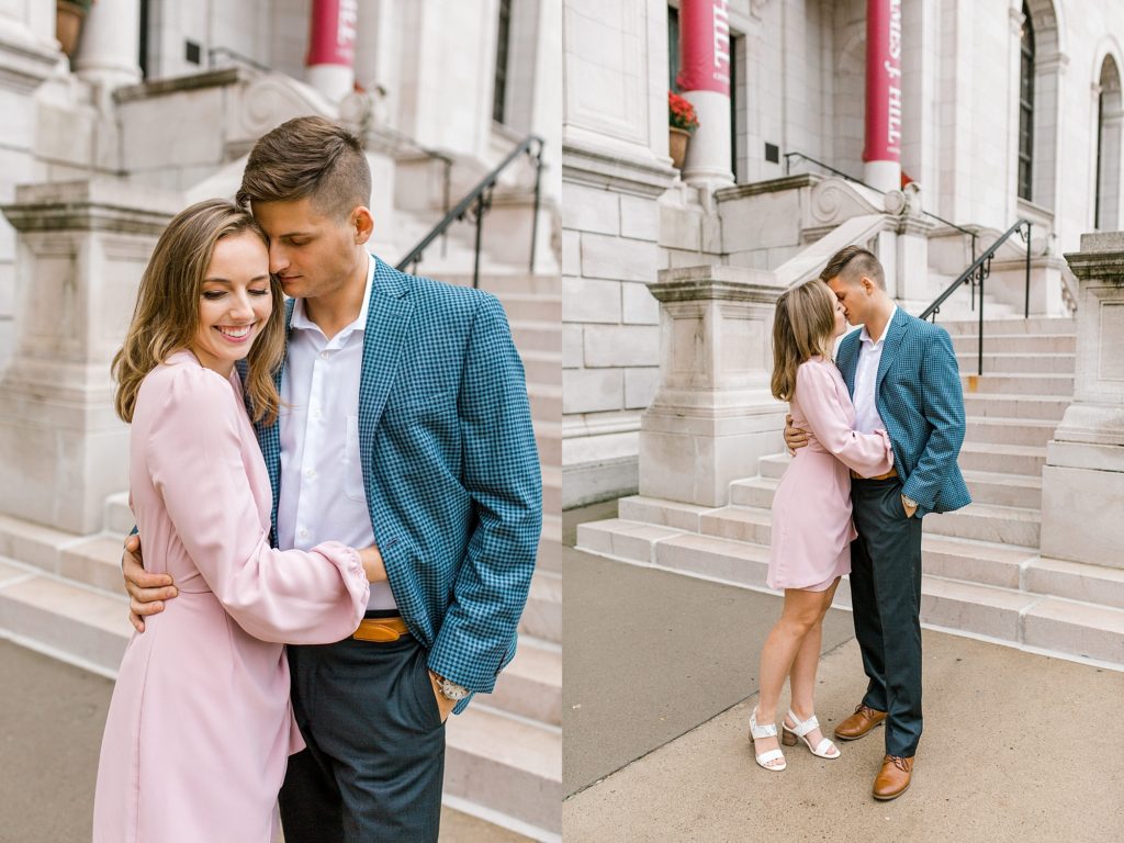 Couple snuggling for engagement photos at library