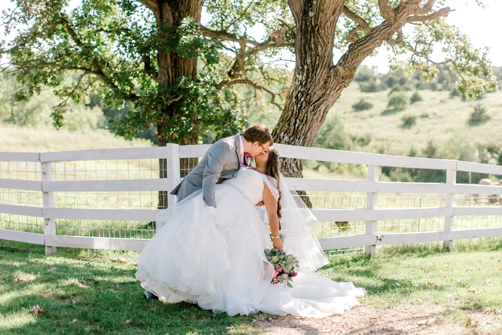 Almquist Farm wedding couple kissing