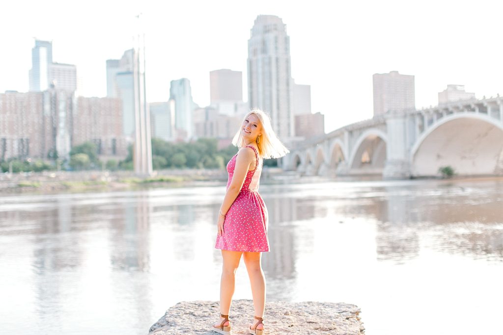 Senior girl in front of Minneapolis skyline