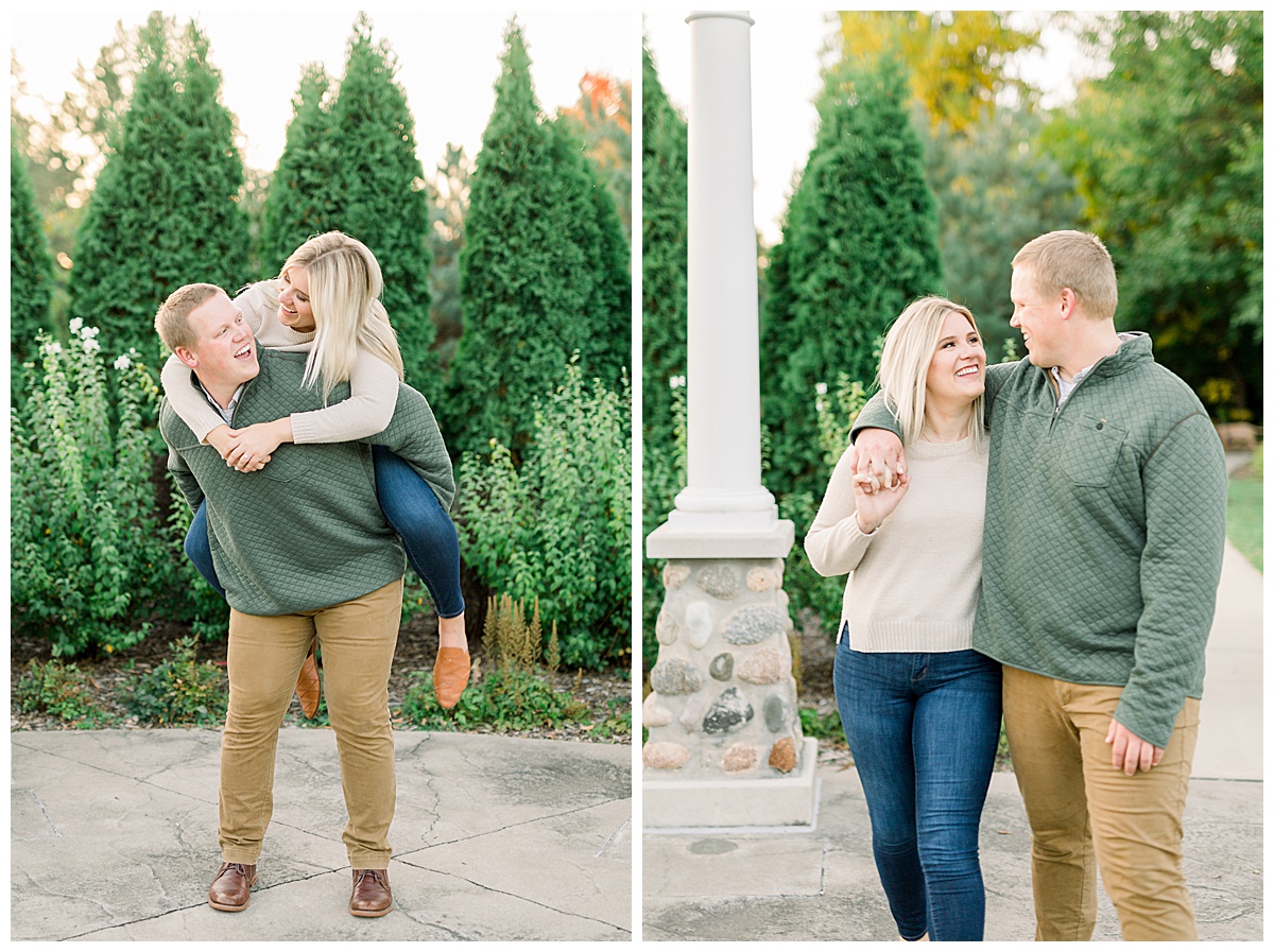 man carrying woman in engagement photos