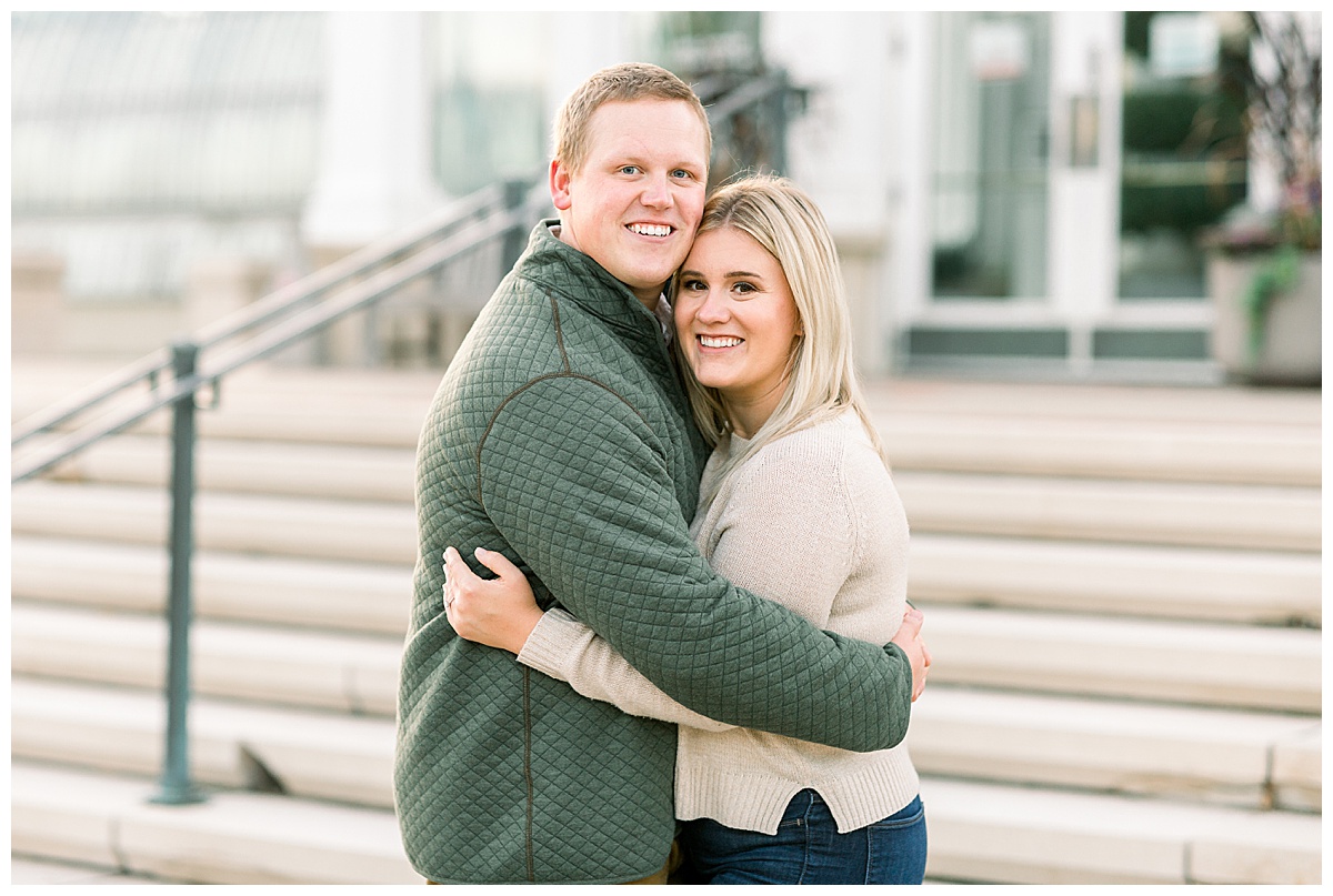 couple hugging for engagement photos