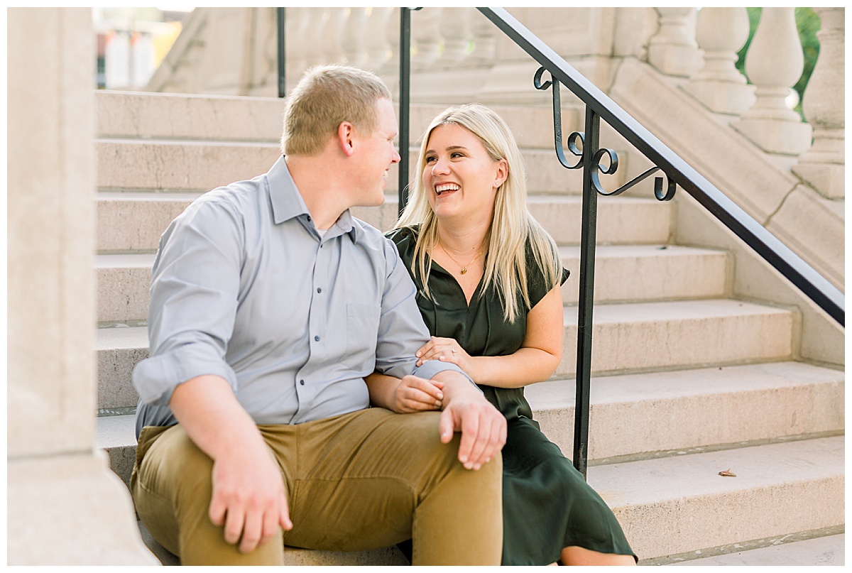 engaged couple laughing in saint paul