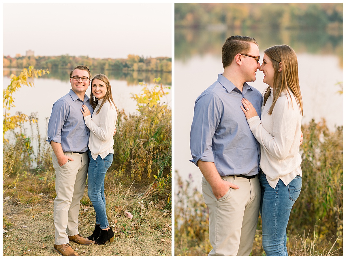 couple smiling for fall engagement photos