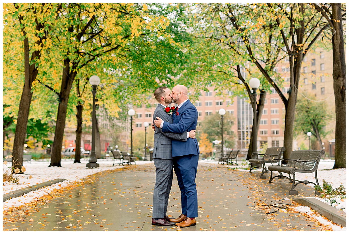 same-sex couple kissing in saint paul fall