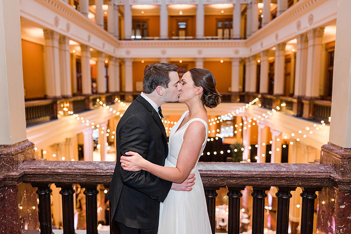 Landmark Center wedding bride and groom kissing
